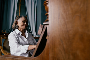 woman looking through window