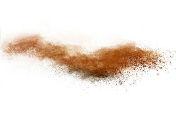 Obraz na płótnie Canvas Brown powder explosion isolated on white background.