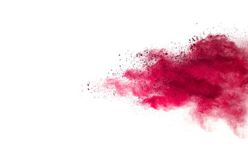 Red powder explosion on white background. 