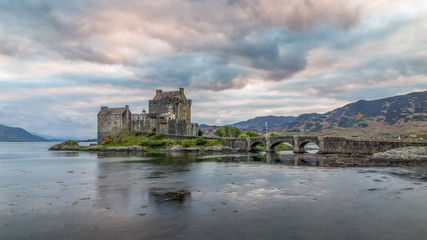 Eilean Donan Castle Scotland landmark Scottish old fortress medieval lake bay bridge beautiful view long exposure