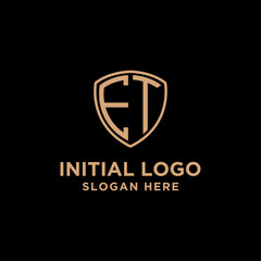 initial letters logo E T black background shield shape