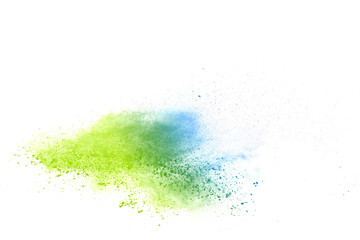 Freeze motion of colorful color powder exploding on white background.  Paint Holi.