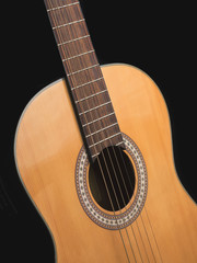 Fototapeta premium acoustic guitar on black background