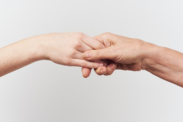 hands of man and woman isolated on white background
