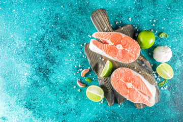 Raw salmon fish steaks with spices