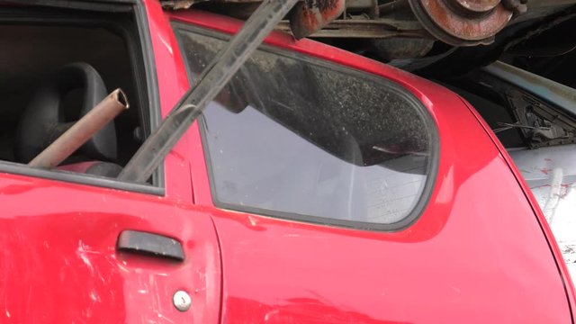 Someone breaks a window in the car.