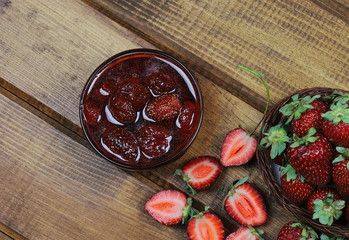  strawberry and strawberry jam in bulk on wooden board