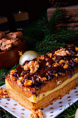 Chocolate gingerbread with filling, jam and nuts
