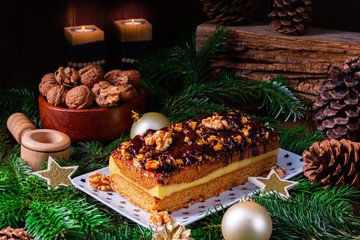 Chocolate gingerbread with filling, jam and nuts