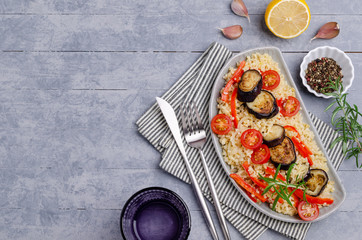Bulgur with slices of fried vegetables