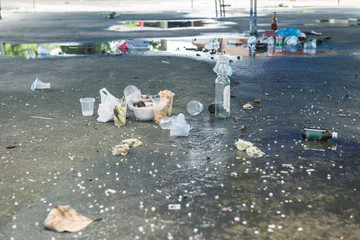 dirty garbage on the ground after party event