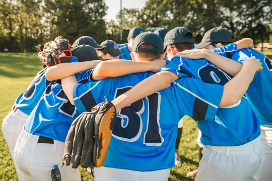 Group of baseball players standing together on the playground - Powered by Adobe