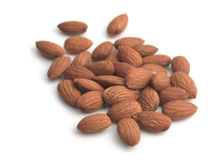 Almond nuts isolated on white background.