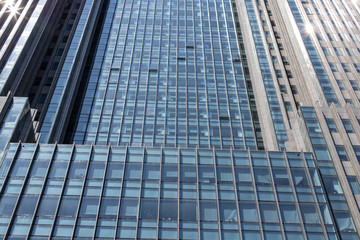 Fototapeta premium Skyscraper is a high-rise building. A business center that will take your business to heaven. If you need fresh air, you can open the windows.