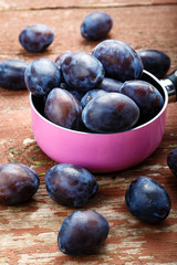 ripe plums in a saucepan
