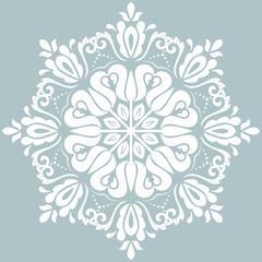 Oriental vector pattern with arabesques and floral elements. Traditional classic round white ornament. Vintage pattern with arabesques