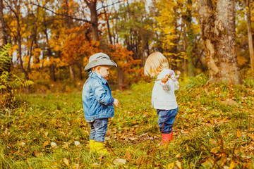 Two little boys standing in front of each other