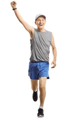 Elderly man jogging and gesturing happiness