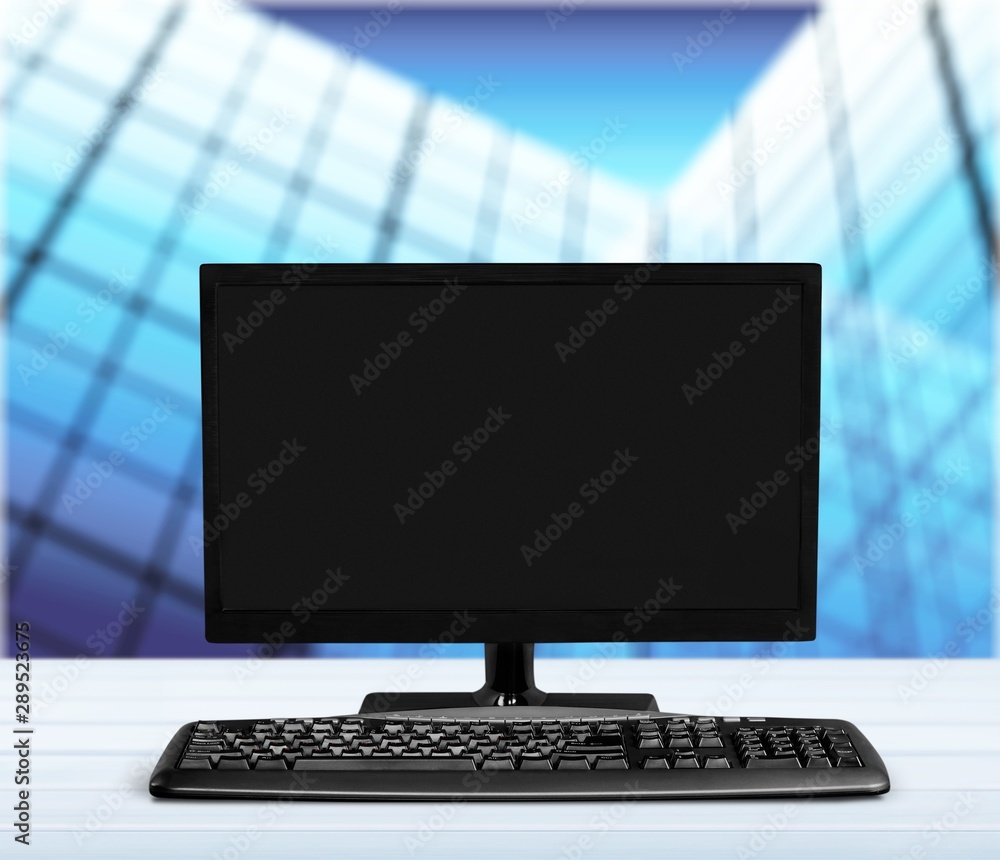Poster desktop computer and keyboard on background