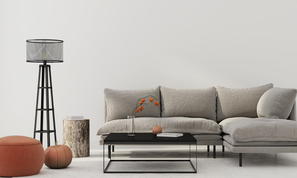 Living room interior with gray sofa and terracotta pouf