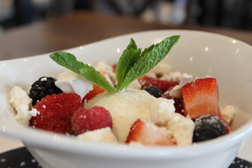 fresh salad with strawberries and cream