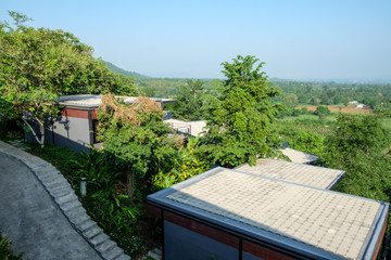 Fototapeta na wymiar View from the room can see the green trees,beautiful sky with greenery of nature,pure oxygen environment in the embrace of the mountains of the city, surrounded by nearby Khao Yai.The back background.