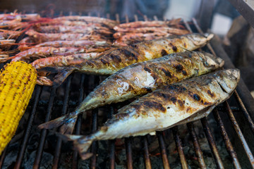 Appetizing grilled fish on a fest food. Steet food.