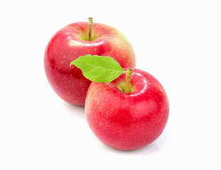 Ripe apples with leaf isolated.