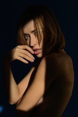 Studio portrait of a beautiful young woman