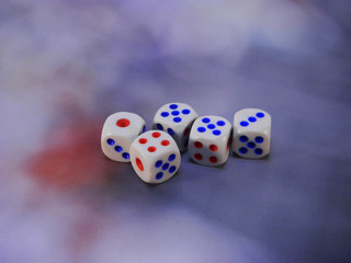 dice isolated on a blue background
