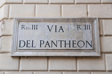 Street sign on marble plate:  Via del Pantheon, Rome, Italy
