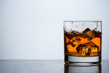 Whiskey in a glass with ice.