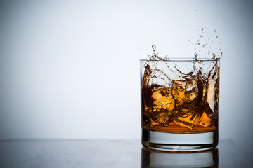 Whiskey in a glass with ice.
