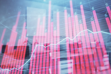 Stock market chart with trading desk bank office interior on background. Double exposure. Concept of financial analysis