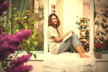 beautiful woman with a book