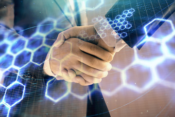 Double exposure of tech drawing on abstract background with two men handshake. Concept of technology in modern business