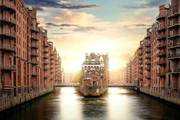 Hamburg, Germany - The famous Water castle in the Speicherstadt Hamburg, the castle on the water at the warehouse district in Hamburg - obrazy, fototapety, plakaty