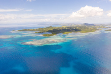 Naklejka na ściany i meble Bucas Grande Island, Philippines. Beautiful lagoons with atolls and islands, view from above. Seascape, nature of the Philippines.
