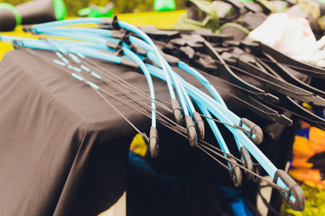many Bow for shooting and arrows on the table for training in shooting against the background of...