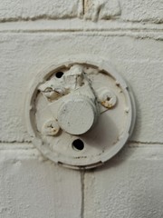 old water valve on the wall