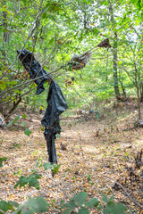 Plastic bags inside a beautiful forest. Environmental pollution.