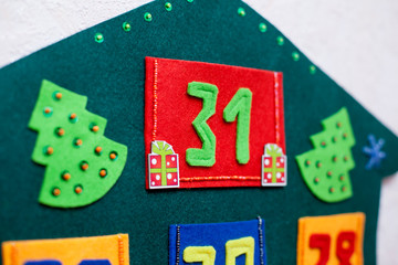 The last day of the year December 31 on the advent calendar of felt