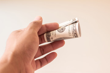 Young man prepare dollar to pay shopping,Dollar is in hands of men,Business,market,Sell,Promotion,e-commerce,Shopping online