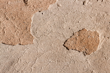 Old cob wall with cracked surface