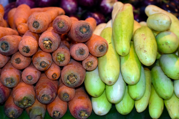 close up shot of carrot and cucumber initial
