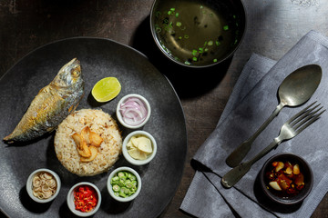 Top view dish of fried rice served with fresh ingredients and soup. Picture of Thai food for menu