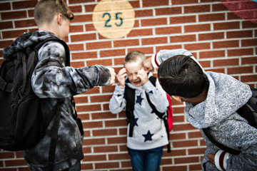 sad intimidation moment Elementary Age Bullying in Schoolyard