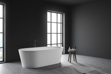 Fototapeta na wymiar Gray loft bathroom corner with bathtub