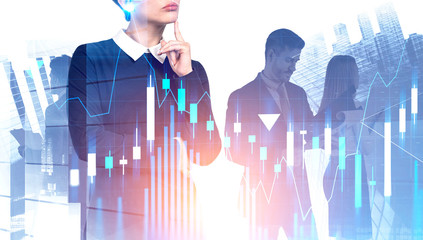 Thoughtful young businesswoman and team, graphs