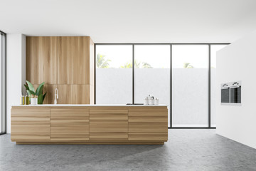 Loft white kitchen, countertop and ovens